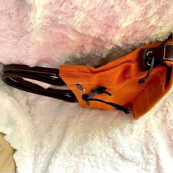 GENTLY used dooney bourke handbag orange. - Picture 6 of 7